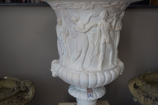 A reconstituted marble Borghese urn on stand, diameter 64cm, height 146cm